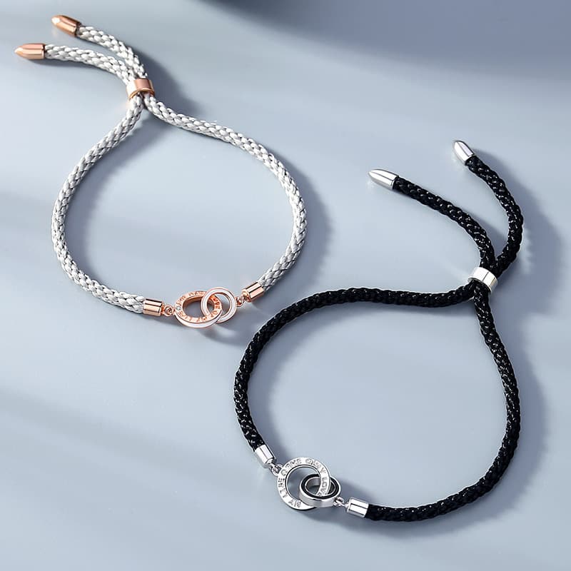 ペアブレスレット 二重円環編み込みレザー調ペア腕輪